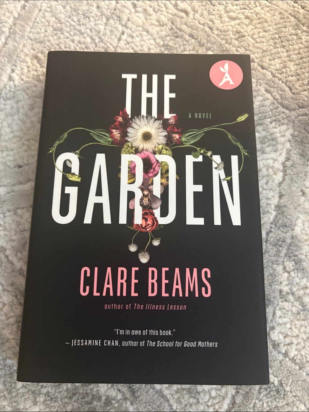 The Garden by Clare Beams - Black Cover with Pink Title